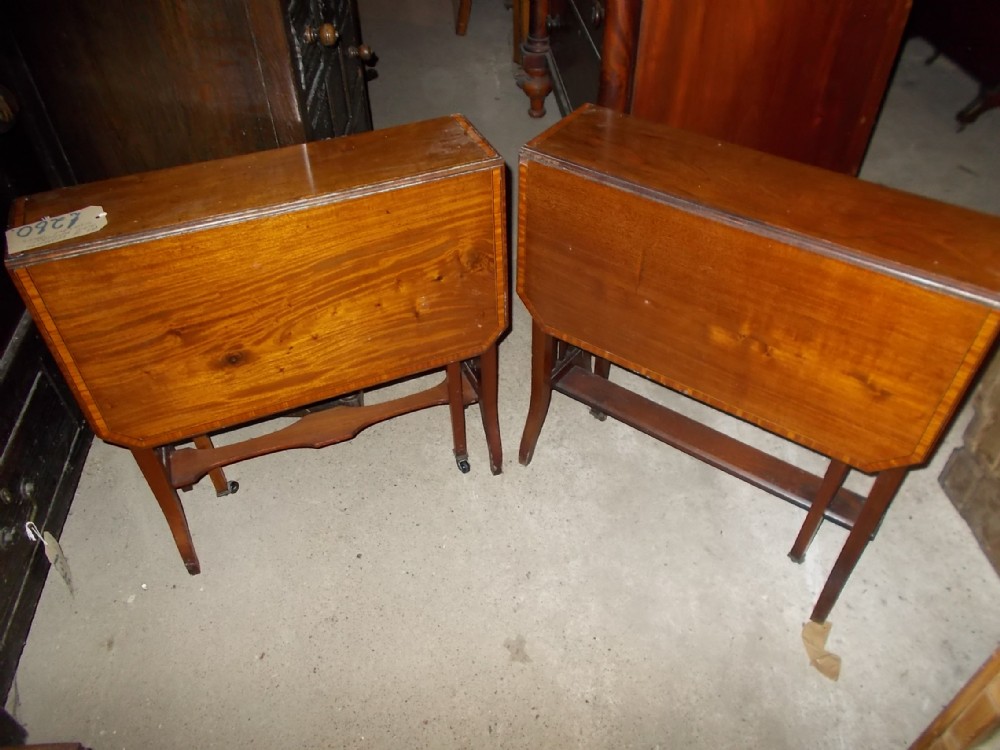 A very close matched pair of Edwardian Sutherland tables