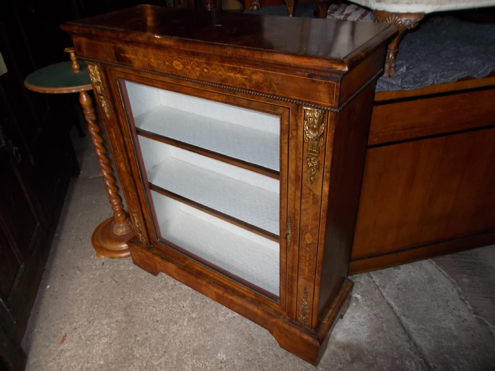19th century inlaid gilt metal mounted pier cabinet
