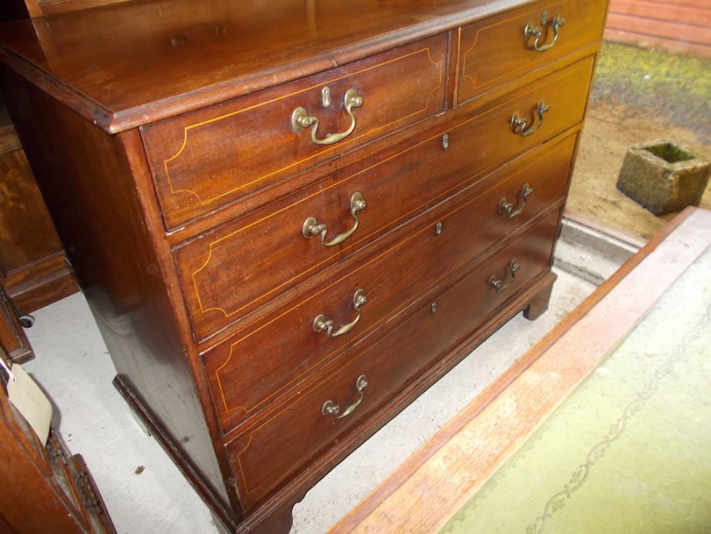 Early 19th century inlaid mahogany chest of drawers
