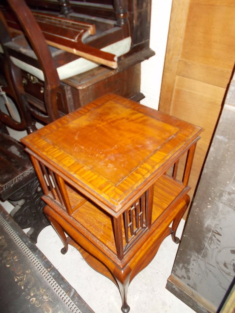 Edwardian inlaid and banded satinwood revolving booktable