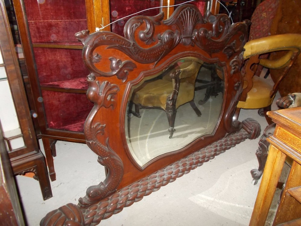 Interesting and unusual carved 6 foot wide  overmantel mirror