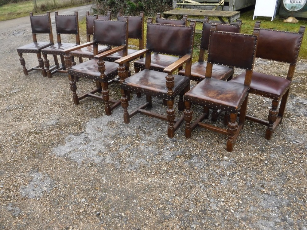 Set of 10 early 20th century carved oak dining chairs