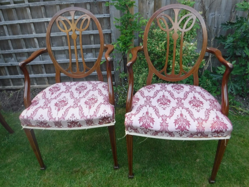 Pair of Edwardian inlaid mahogany armchairs