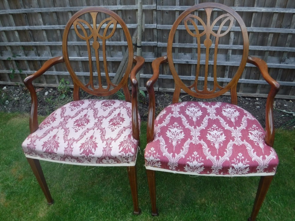 Pair of Edwardian inlaid mahogany armchairs