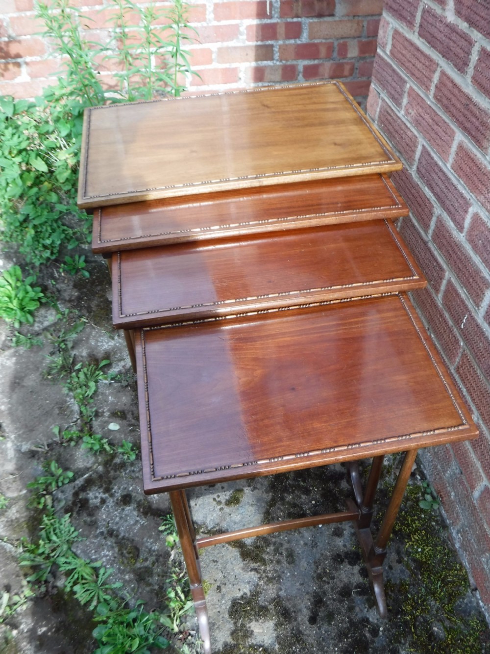 Good nest of solid mahogany tables