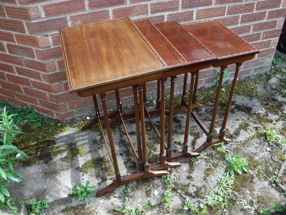 Good nest of solid mahogany tables View II