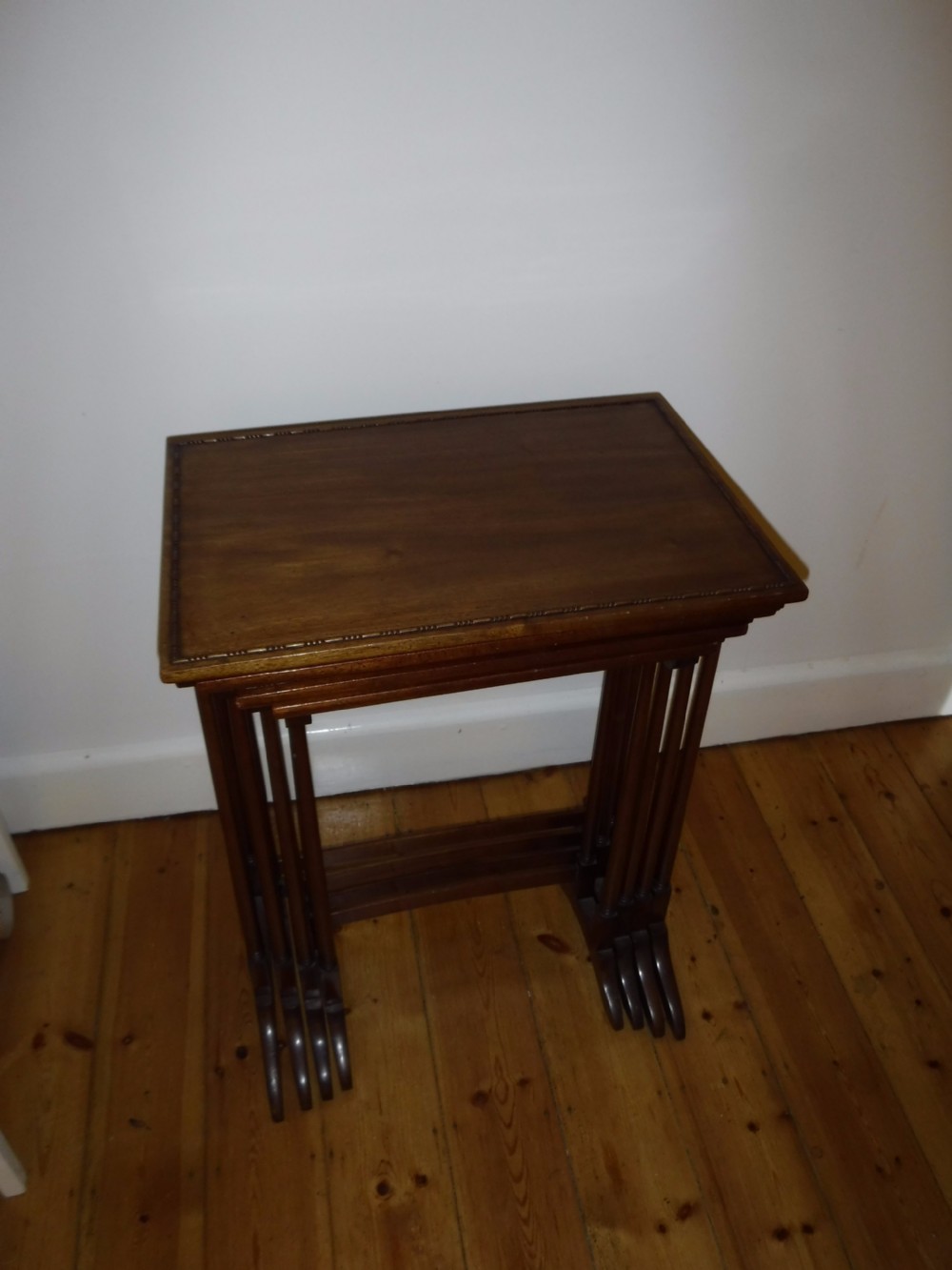 Good nest of solid mahogany tables View IV