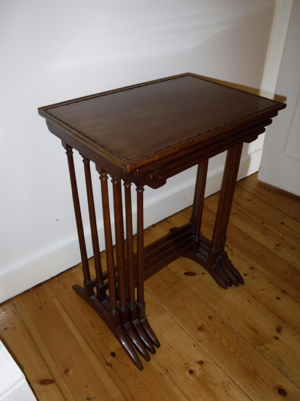 Good nest of solid mahogany tables View V
