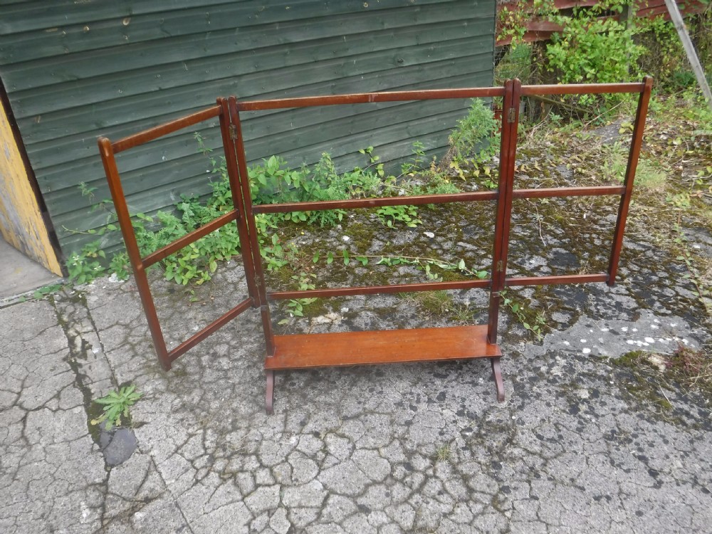 Useful Edwardian mahogany folding towel rail