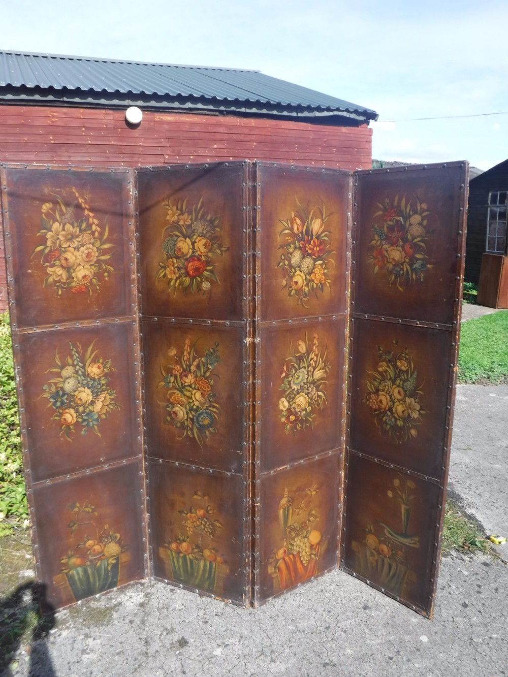Early 20th century painted 4 fold leather screen