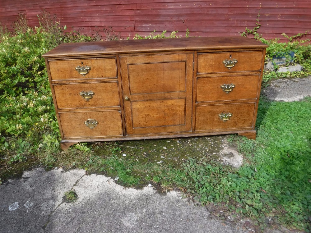 Useful early Victorian oak country house dresser base View II