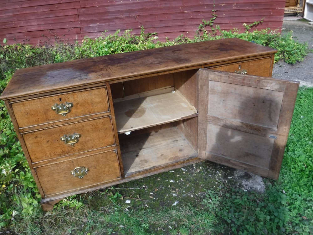 Useful early Victorian oak country house dresser base View III