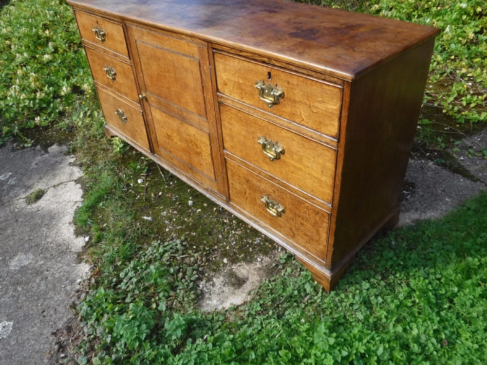 Useful early Victorian oak country house dresser base View IV