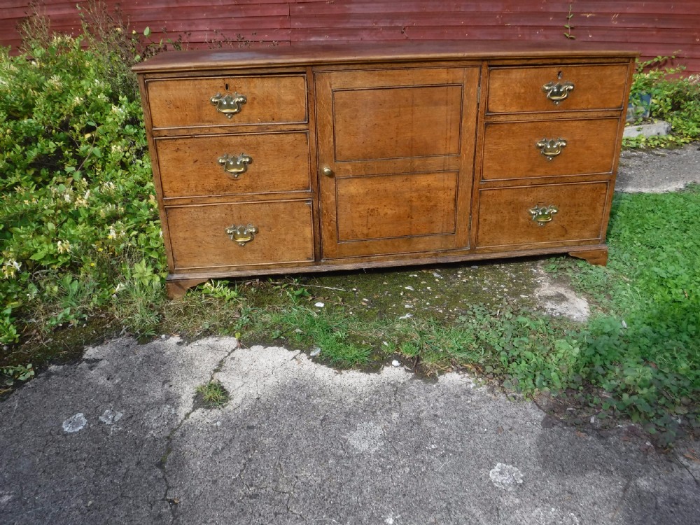 Useful early Victorian oak country house dresser base View VI
