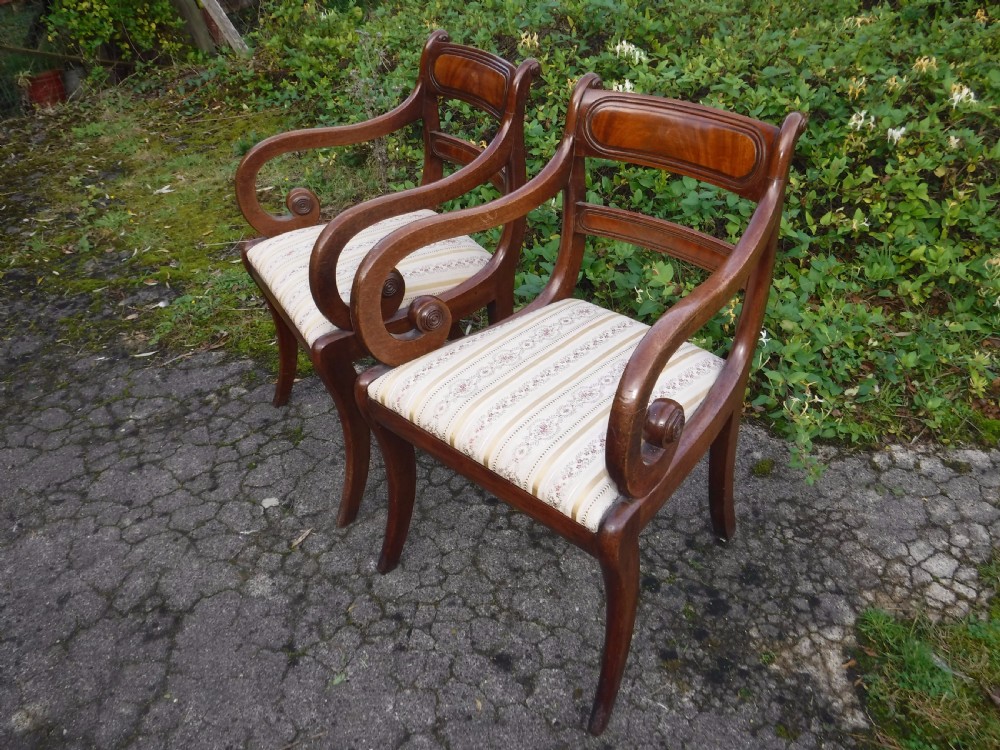 Pair of 19th century mahogany sabre leg armchairs View II