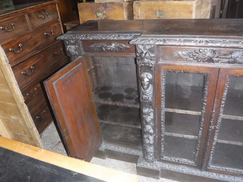 Victorian carved oak breakfront bookcase cabinet View V