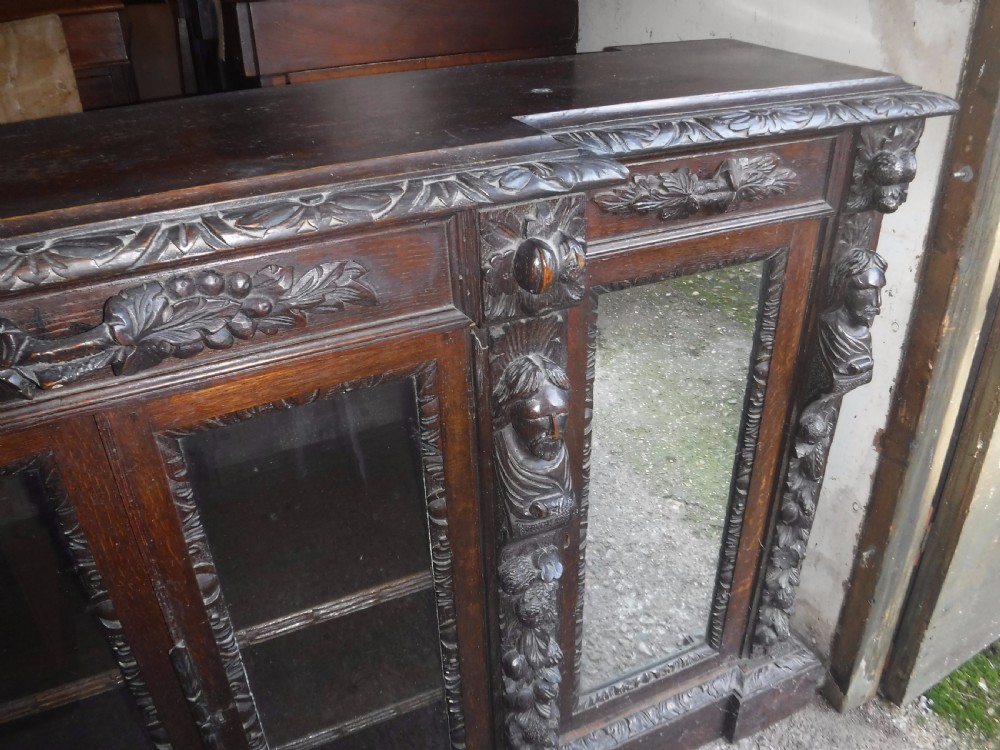 Victorian carved oak breakfront bookcase cabinet View VI