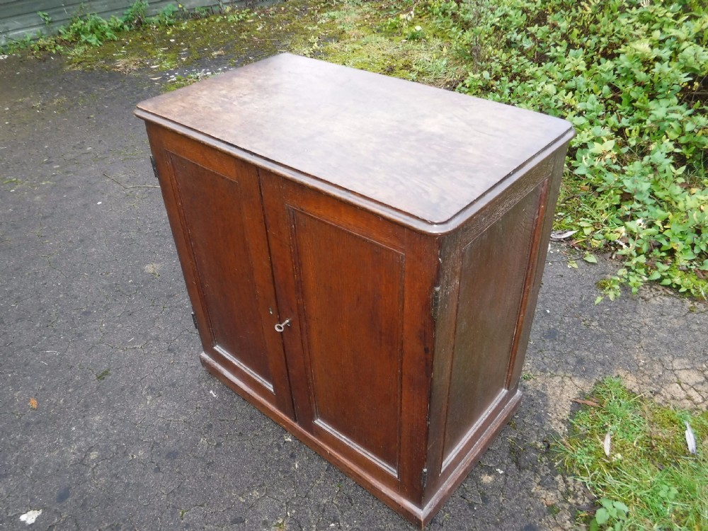 Useful early Victorian country house oak  2 door  cupboard View II