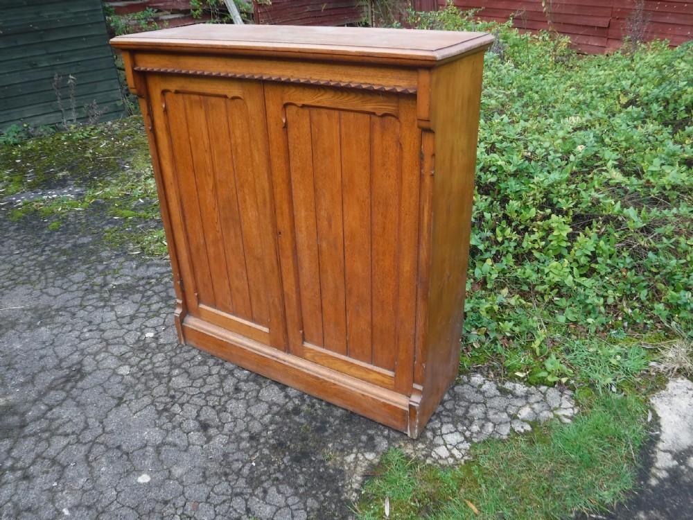 Useful Victorian oak 2 door [toy cupboard