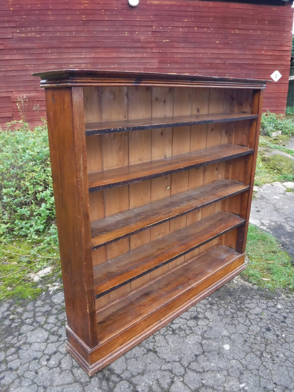 Useful 19th century country house pine open front bookcase