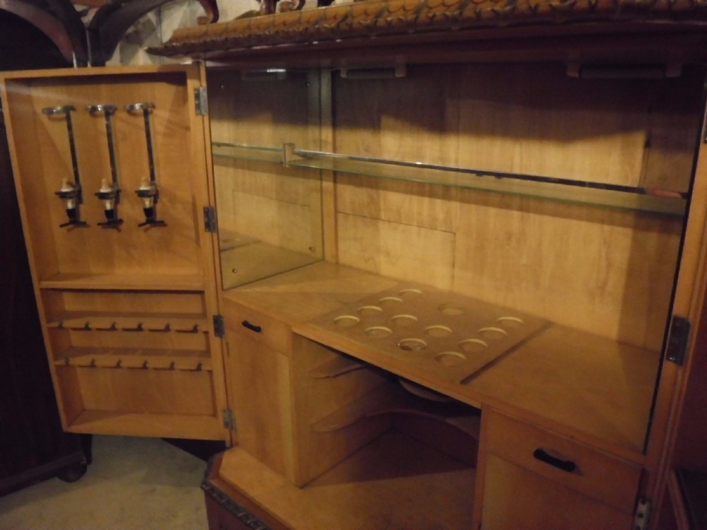 Large early 20th century satinwood cocktail cabinet,fitted interior. View VII