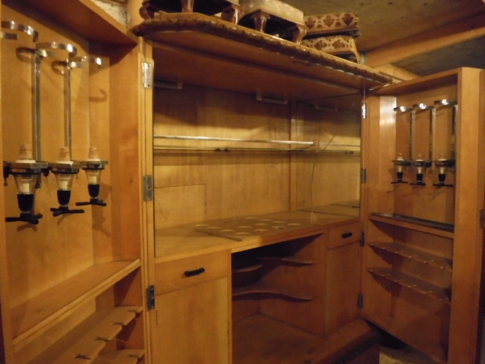 Large early 20th century satinwood cocktail cabinet,fitted interior. View IX