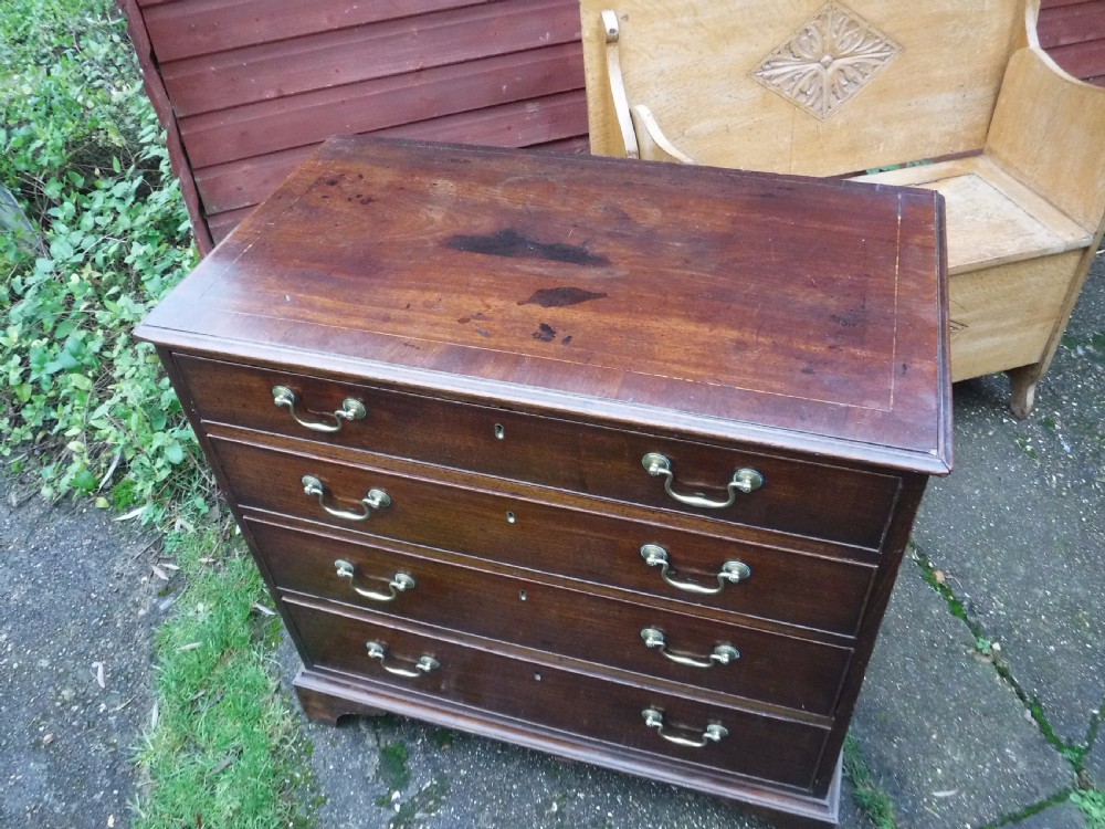 Small Late Georgian mahogany chest of 4 l drawers View III