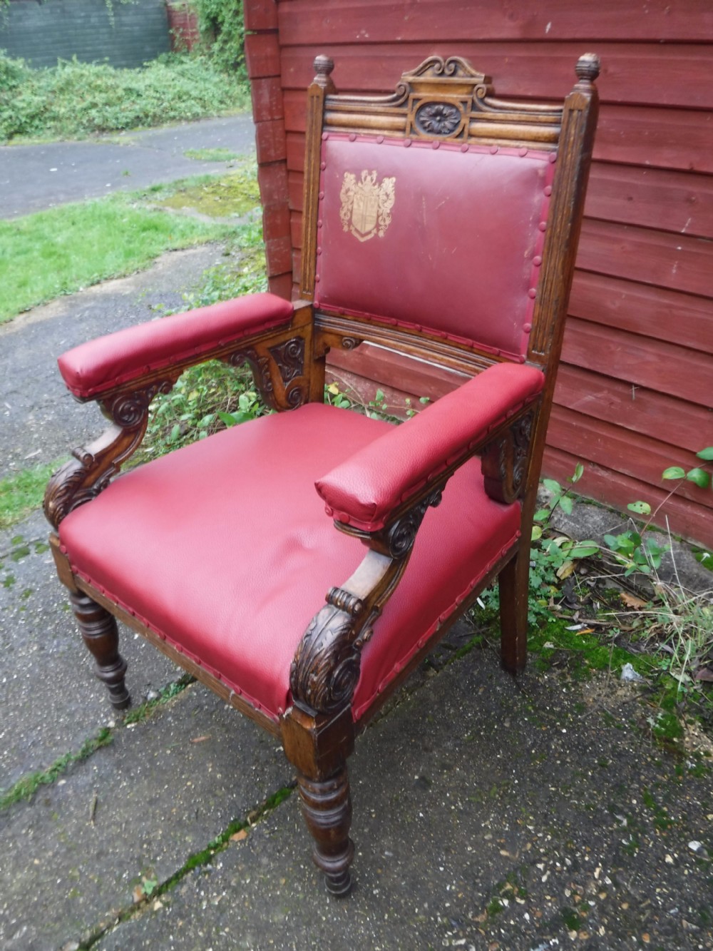 Large  oak frame  desk armchair with  coat of arms View II