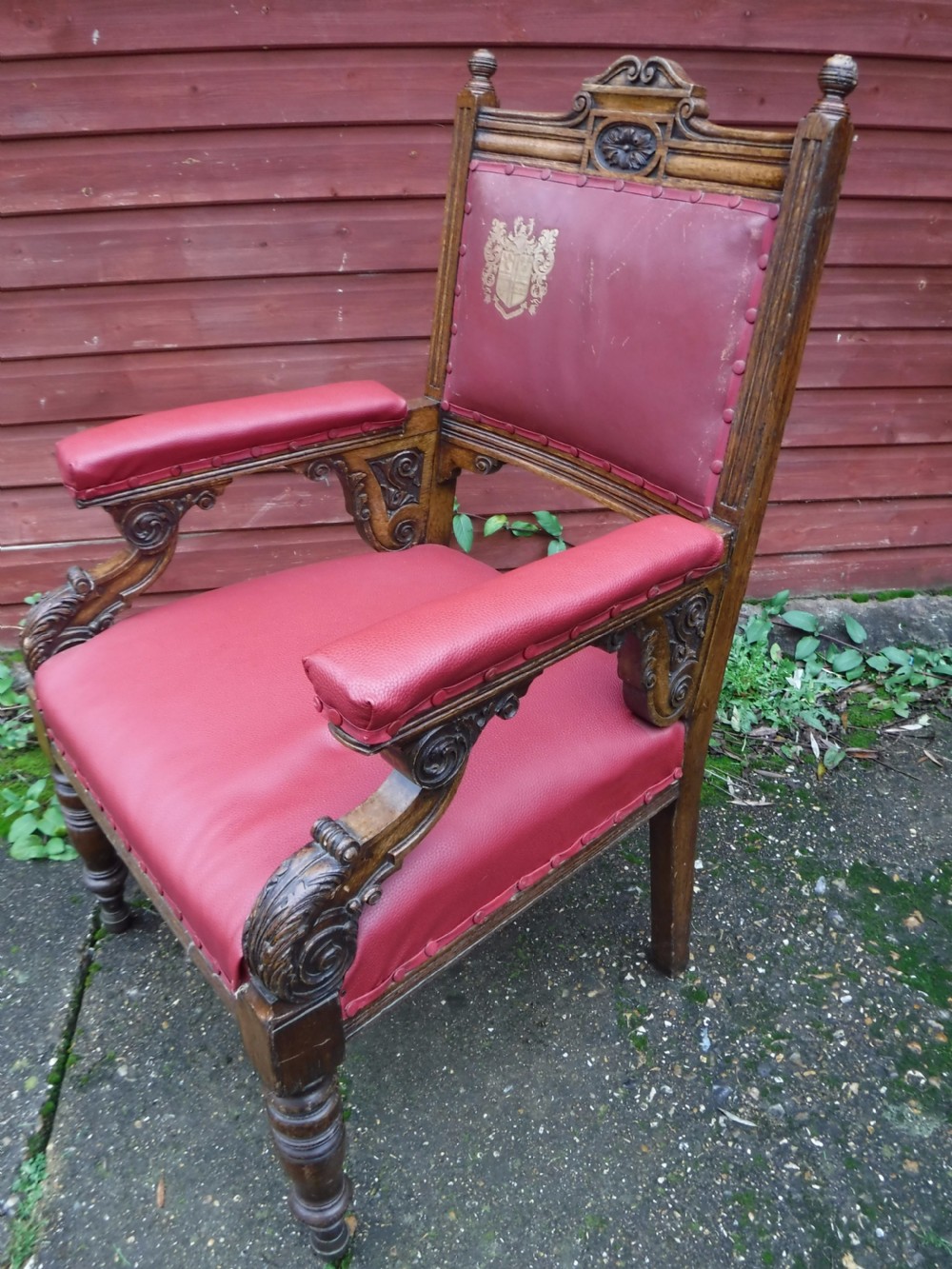Large  oak frame  desk armchair with  coat of arms View III