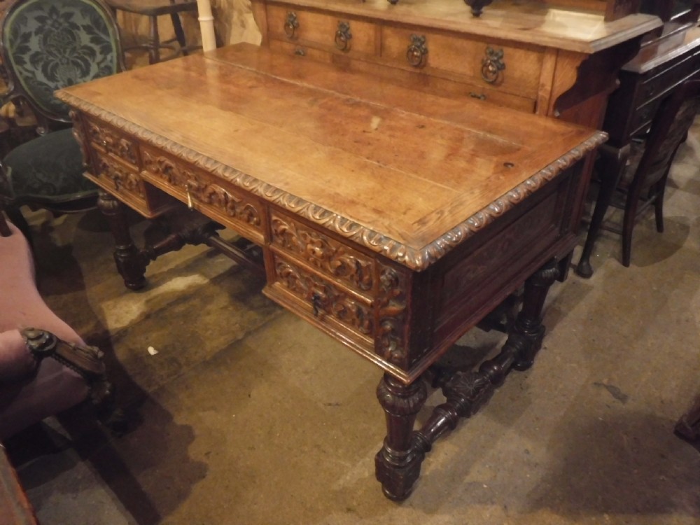 Late 19th century carved oak writing desk View II