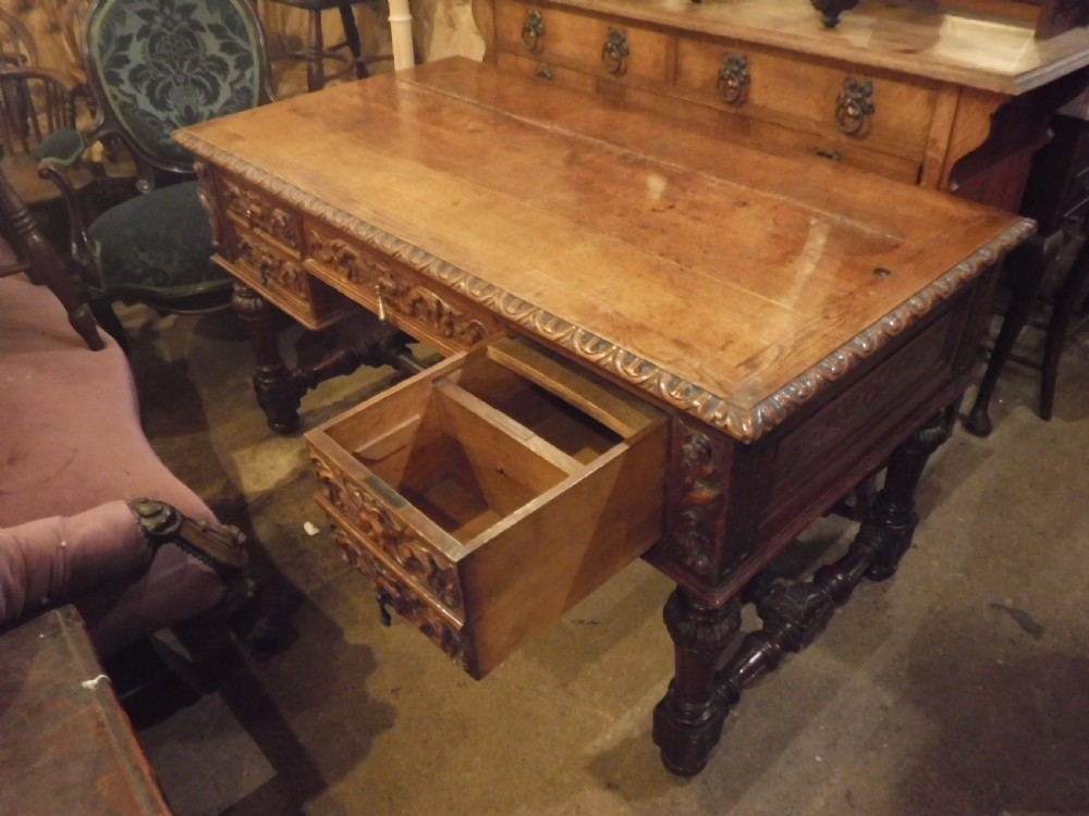 Late 19th century carved oak writing desk View III