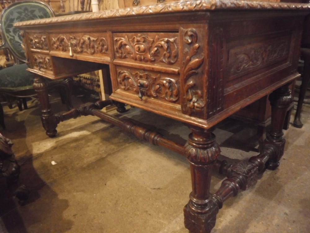 Late 19th century carved oak writing desk View IV