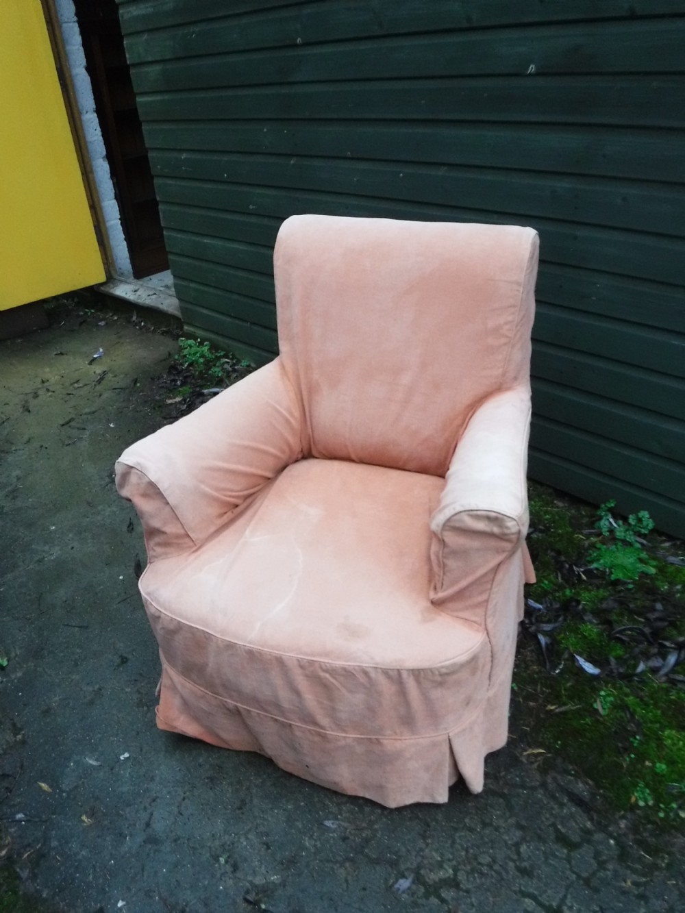  Upholstered armchair with salmon pink loose cover View II