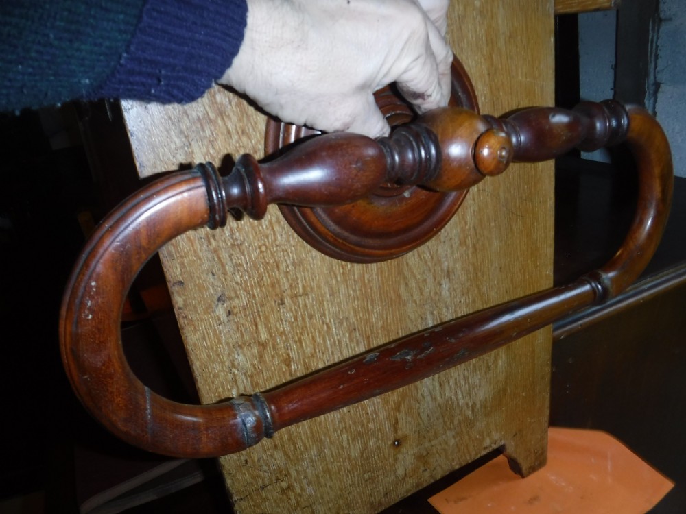 Late 19th century mahogany wall mounted towel rail. View II