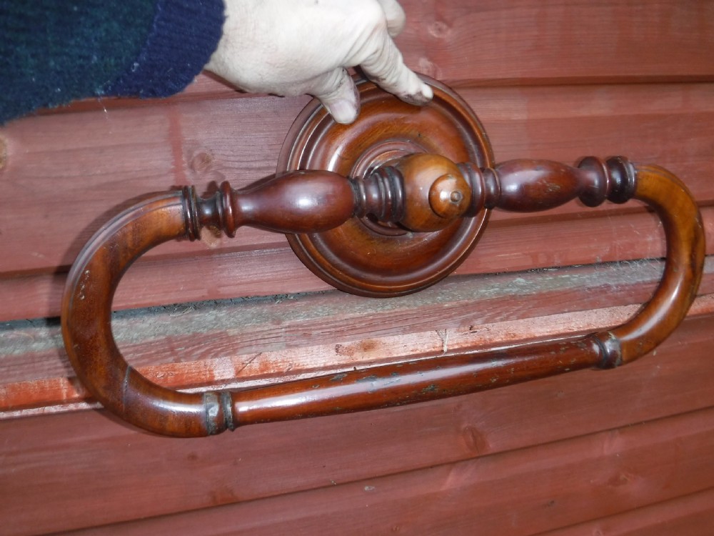 Late 19th century mahogany wall mounted towel rail. View III