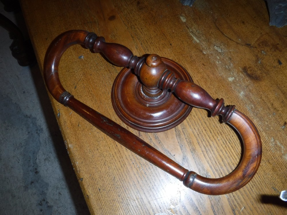 Late 19th century mahogany wall mounted towel rail. View IV