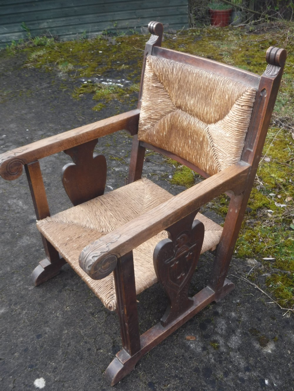 Unusual oak art and crafts rush seat armchair View II