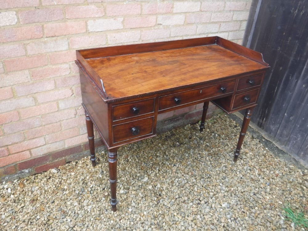 Regency mahogany 5 drawer writing table View V