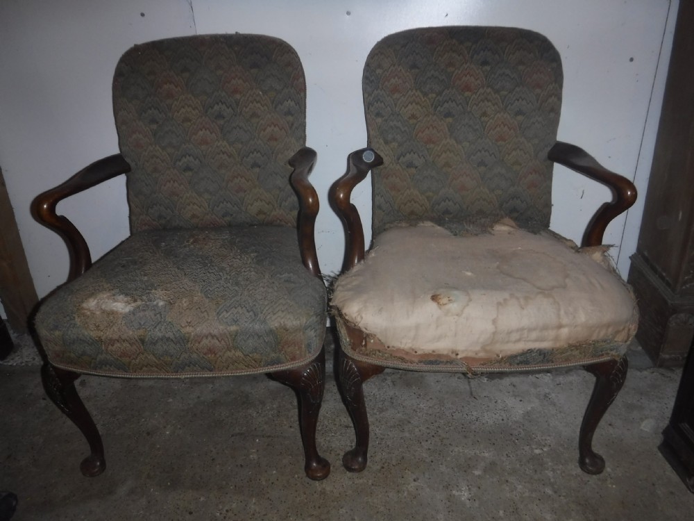 Pair of early 20th century walnut desk armchairs