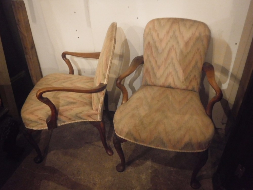 Pair of early 20th century walnut desk armchairs