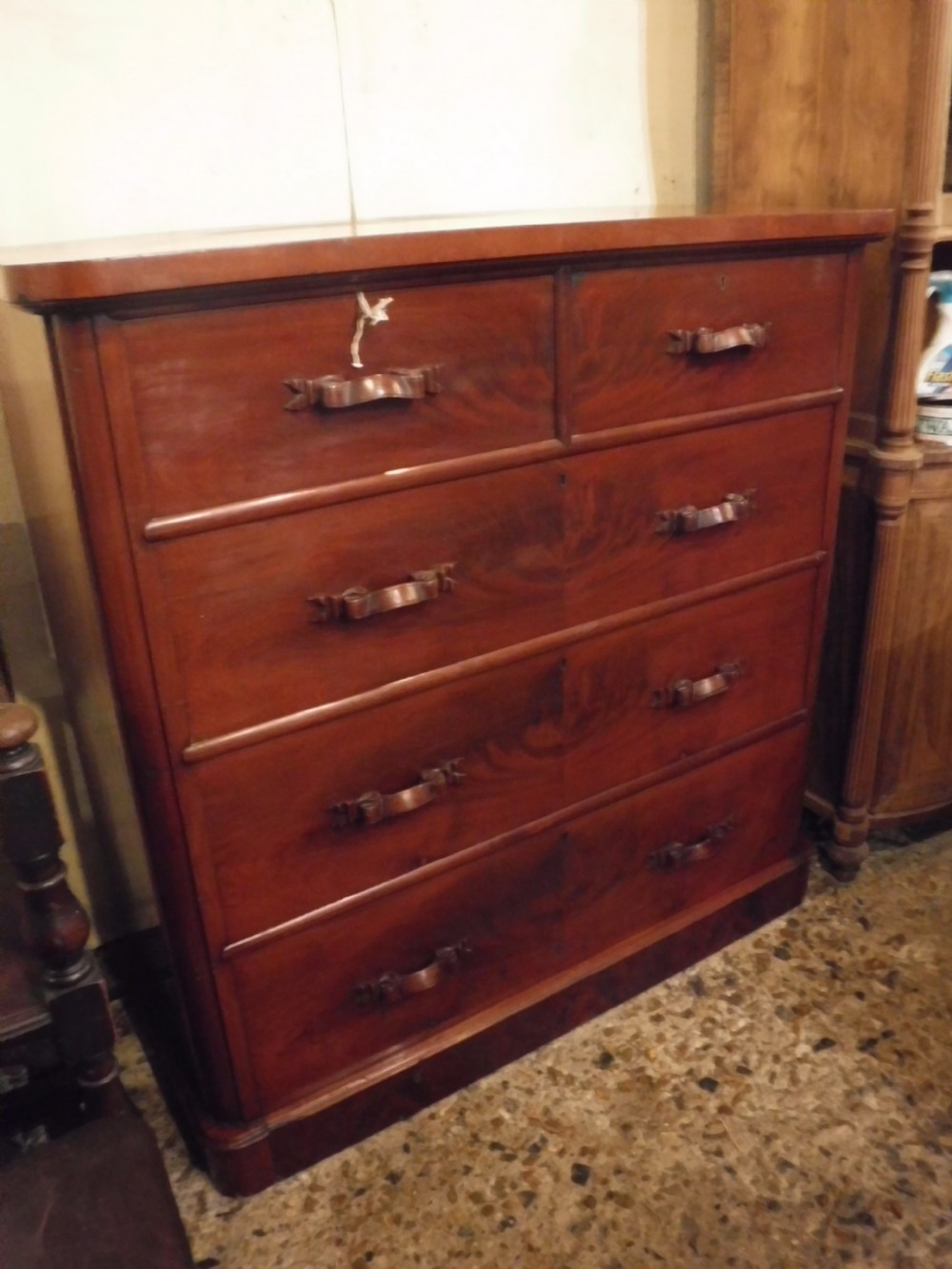 Practical Victorian chest of drawers with carved handles