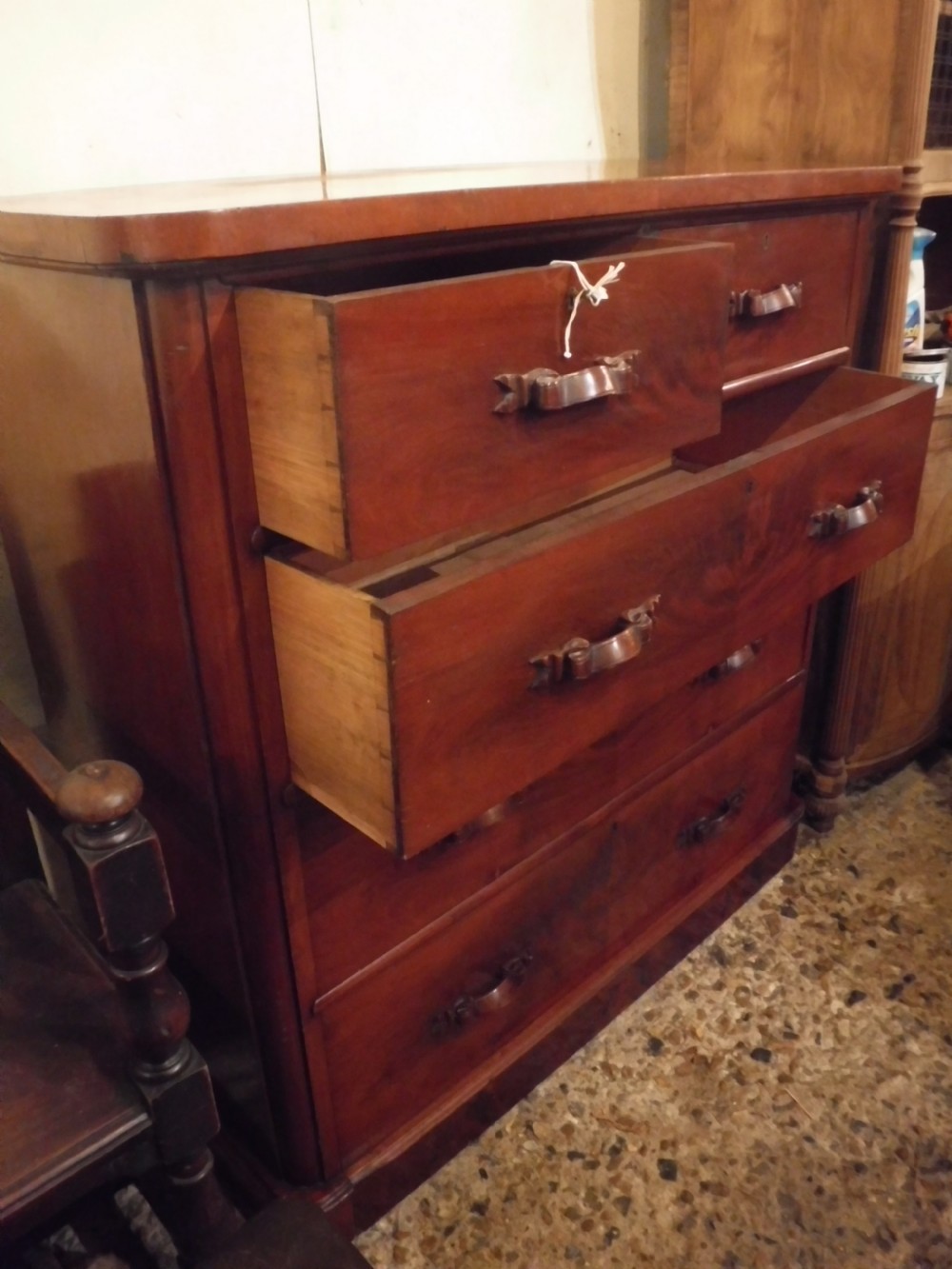 Practical Victorian chest of drawers with carved handles View II