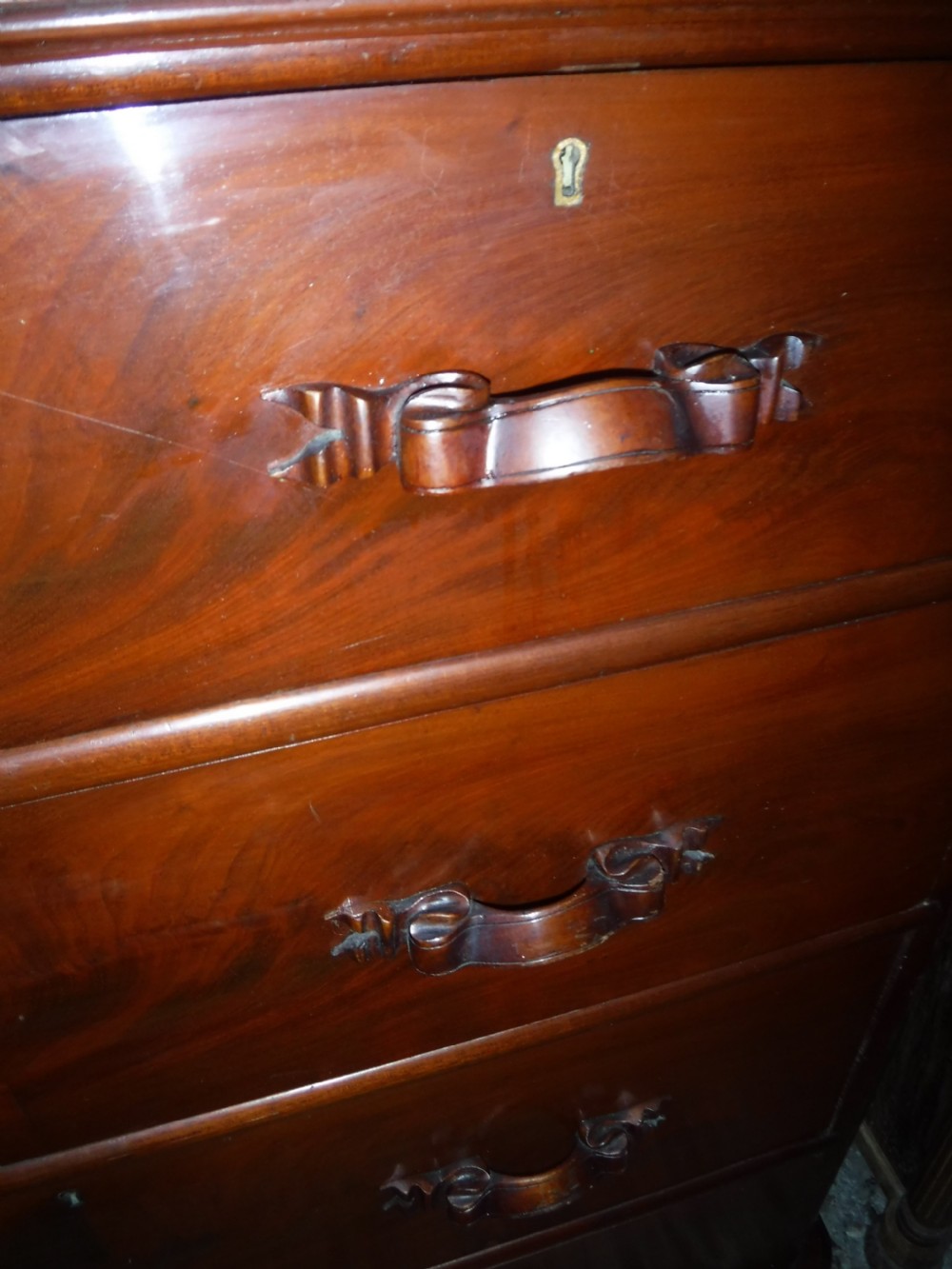 Practical Victorian chest of drawers with carved handles View III