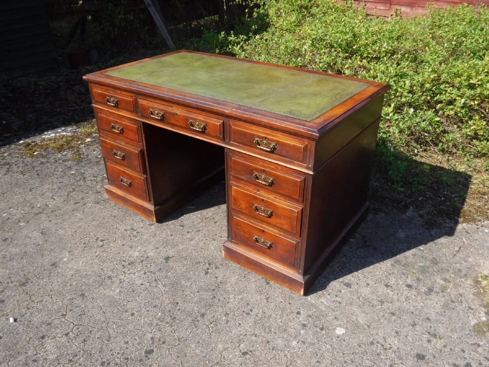 Late 19th century pedestal desk by Maple and Co