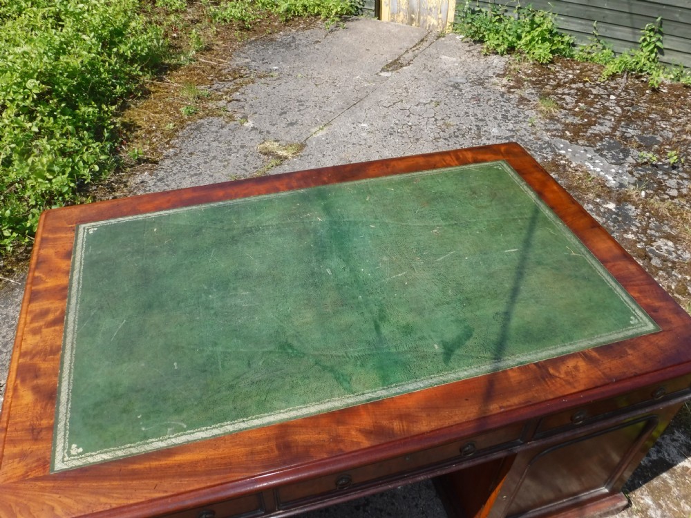 Mid 19th century mahogany double pedestal partners desk. View XI
