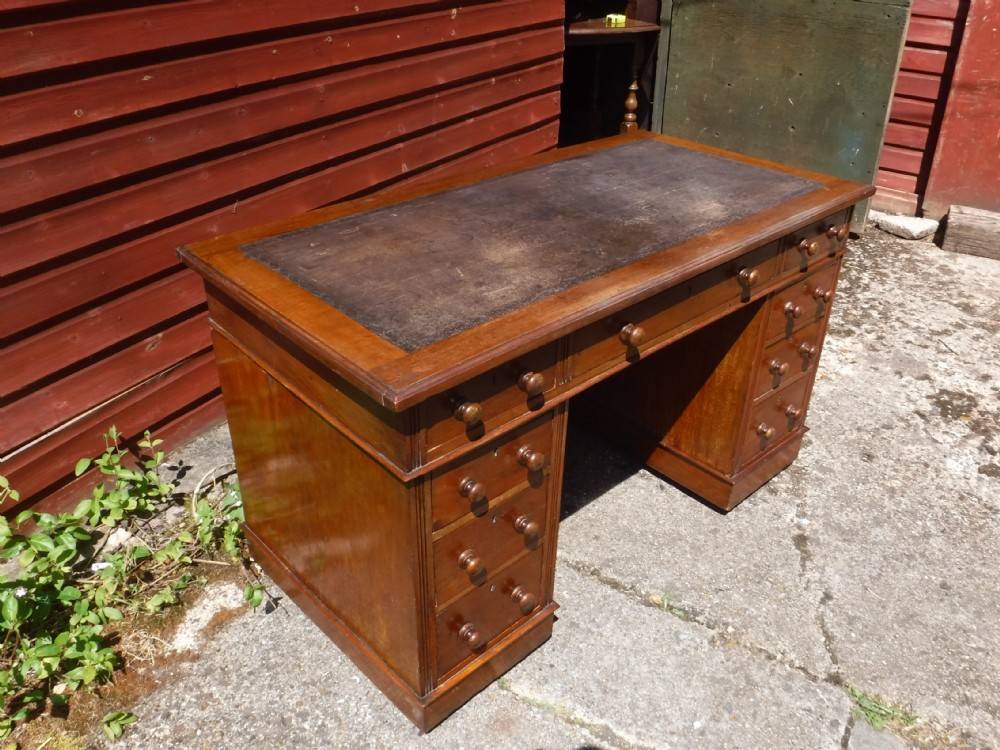 Neat late Victorian kneehole pedestal desk