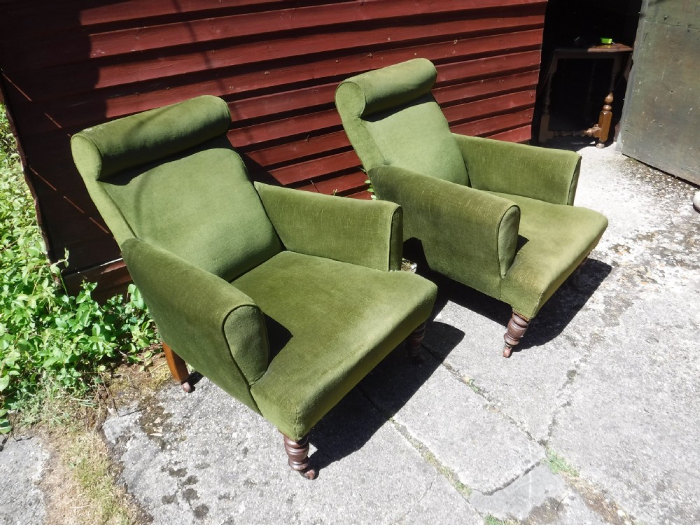 Pair of Late Victorian roll back upholstered armchairs View III