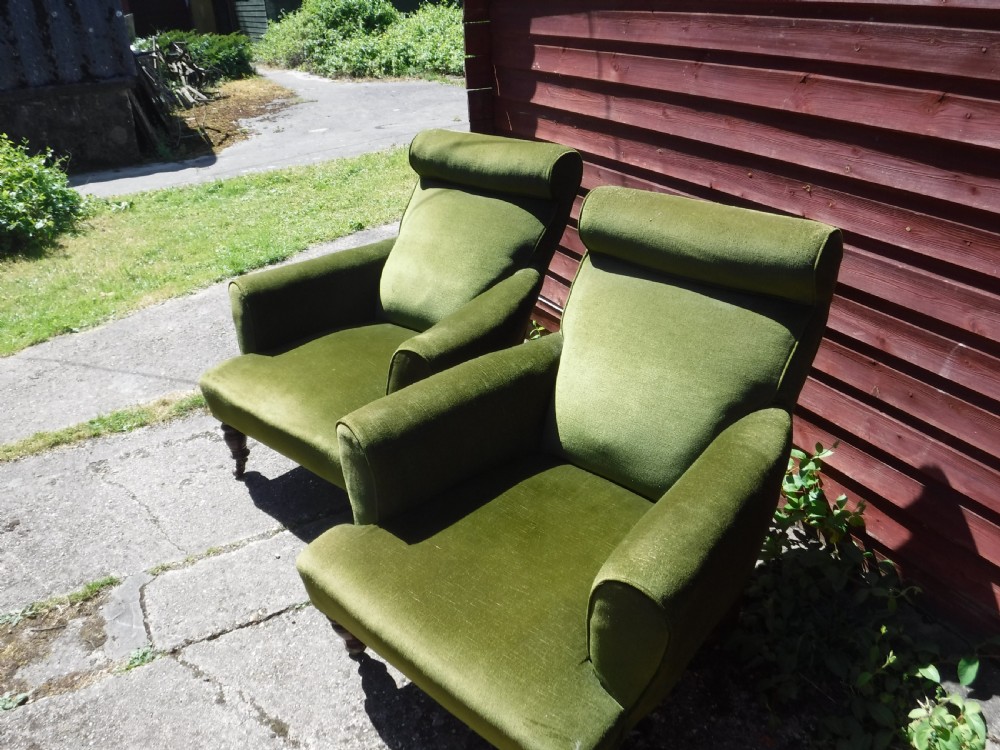 Pair of Late Victorian roll back upholstered armchairs View V