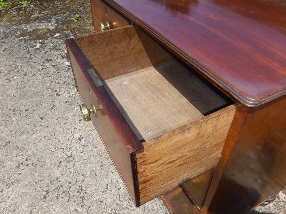 Neat and useful early 19th century mahogany chest of drawers View IV