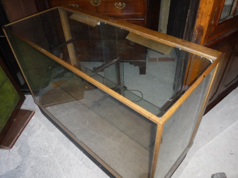 Early 20th century oak shop display cabinet View III